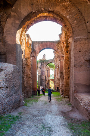 Rome, Italy - November 17, 2018: People in arches gallery hall in Domus Severiana which is the modern name given to the final extension to the imperial palaces on the Palatine Hill in Romeのeditorial素材