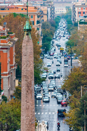 Rome, Italy - November 19, 2018: View on Ferdinando di Savoia street through the obelisk of Piazza del Popolo, large urban square in Rome. The name in modern Italian literally means People Squareのeditorial素材