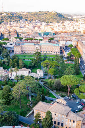 High view on Rome cityscape with green and cozy Vatican gardens and museums buildings on foregroundの写真素材
