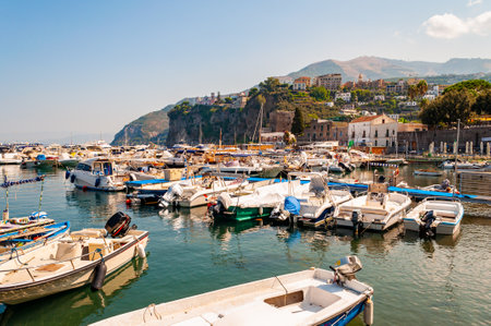 Vico Equense, Naples, Italy - September 05, 2019: The port, commercials docks, urban cityscape and rocky surroundings of Vico Equensea a coastal town and comune in the Metropolitan City of Naplesのeditorial素材