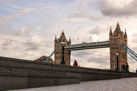 London, United Kingdom - September 14, 2017: Famous cityscape view of London. Thames river promenade with few people and amazing Tower bridge on the backgroundのeditorial素材