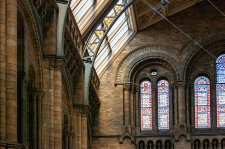 London, United Kingdom - September 15, 2017: Dinosaur skeleton hanging from the ceiling in classic medieval Natural History Museum in Londonのeditorial素材