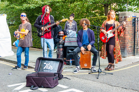 London, United Kingdom - September 16, 2017: Artists performing outdoors on the street. Music band...