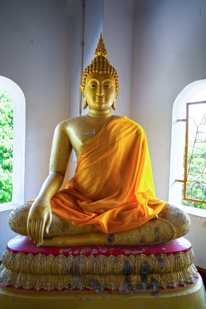 Beatiful Buddhist statue in Thai templeの写真素材
