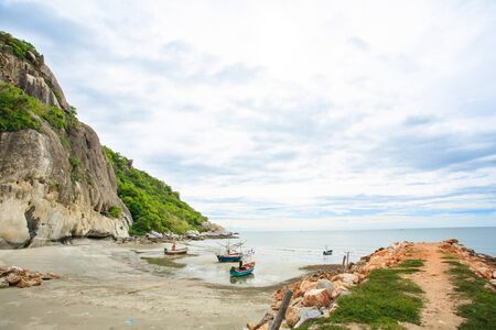 The beach of southern of Thailand with fisherman boatの写真素材