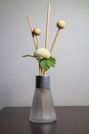 Aromatherapy Oil in small vest with paper flowerの写真素材