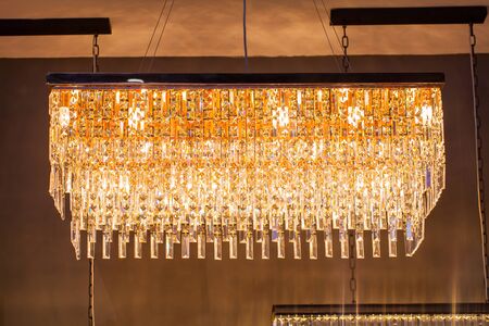 Beautiful chandelier. luxury expensive chandelier hanging under ceiling