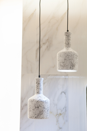 Beautiful chandelier. Modern chandelier hanging under ceilingの写真素材