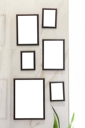 Photo frame on wallの写真素材