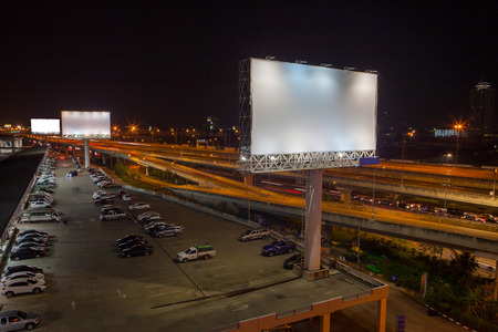 billboard blank for outdoor advertising poster or blank billboard at night time for advertisement. street lightの写真素材