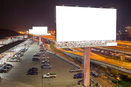 billboard blank for outdoor advertising poster or blank billboard at night time for advertisement. street lightの写真素材