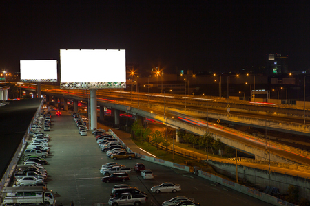 billboard blank for outdoor advertising poster or blank billboard at night time for advertisement. street lightの写真素材