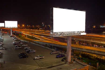 billboard blank for outdoor advertising poster or blank billboard at night time for advertisement. street lightの写真素材