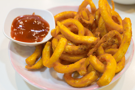 Homemade fast food portion of french fries with Tomato saucesの写真素材