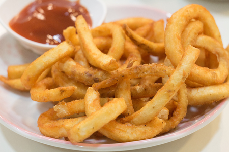 Homemade fast food portion of french fries with Tomato saucesの写真素材