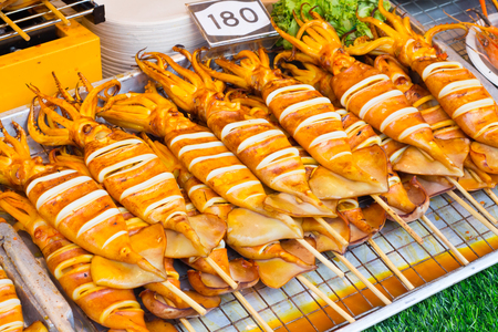 Grilled Squid at street food in thailandの写真素材
