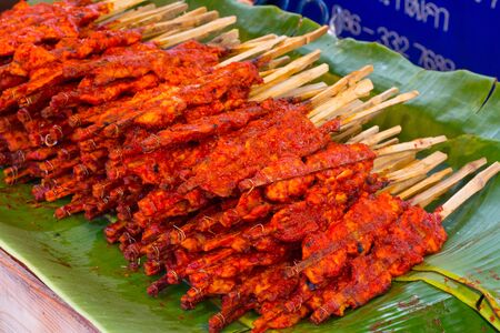 Spicy chicken grilled chicken , Thailand food that little spicy with herbs and coconut milk.の写真素材