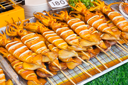 Grilled Squid at street food in thailandの写真素材