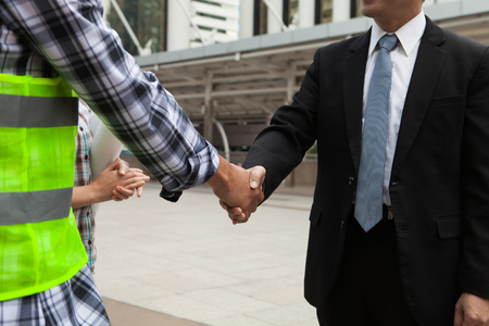 Business Collaboration, Businessmen and engineers Shaking handsの写真素材