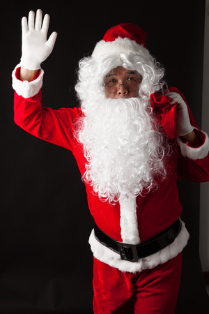 Santa Claus portrait on dark backgroundの写真素材