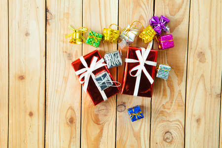 small gift boxes on wooden backgroundの写真素材