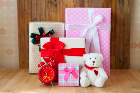 Christmas gift box on wooden background. Merry Christmas and Happy New Year!!の写真素材