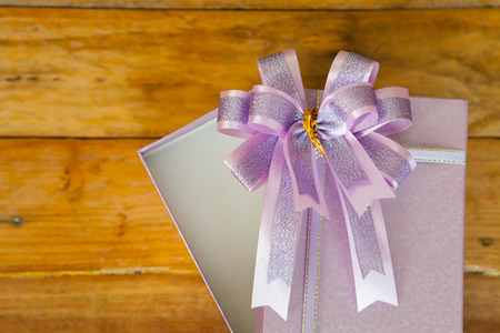 gift boxes on wooden background with copy spaceの写真素材