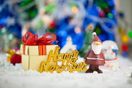 Christmas props decorations on christmas snow field background with copy space.Merry Christmas and happy new year concept.の写真素材