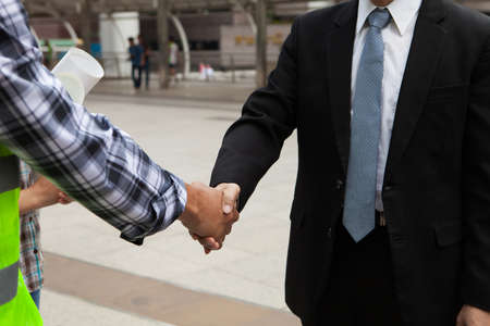 Business Collaboration, Businessmen and engineers Shaking handsの写真素材