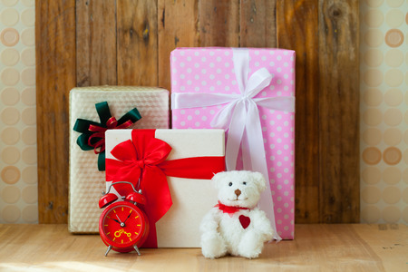 Christmas gift box on wooden background. Merry Christmas and Happy New Year!!の写真素材