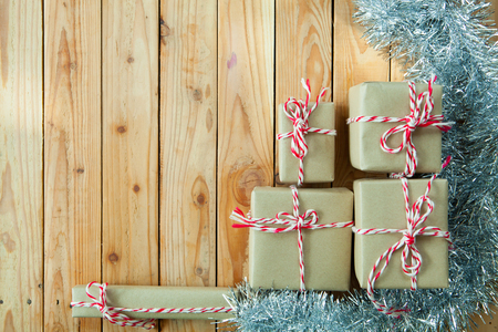 Small gift boxes on wooden backgroundの写真素材