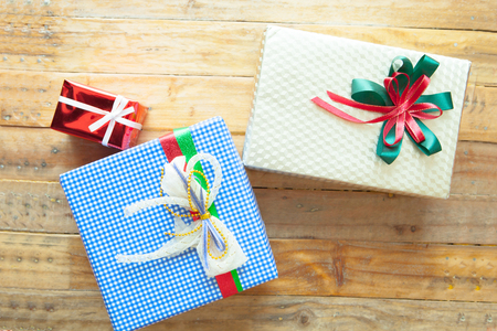 Christmas gift box on wooden background. Merry Christmas and Happy New Year!! Top view.の写真素材