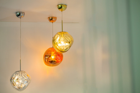 Beautiful chandelier. luxury expensive chandelier hanging under ceilingの写真素材