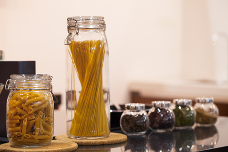 Close up pasta spaghetti Pasta & Noodles in glass bottle with variuos bean  in bottleの写真素材