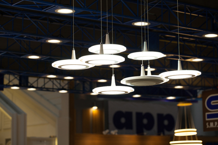 Beautiful chandelier. luxury expensive chandelier hanging under ceilingの写真素材