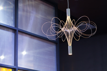 Beautiful chandelier. luxury expensive chandelier hanging under ceilingの写真素材
