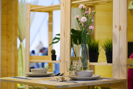 Interrior of restaurant with served table  made of woodの写真素材