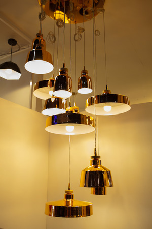 Beautiful chandelier. luxury expensive chandelier hanging under ceilingの写真素材