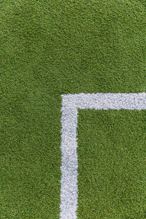 Texture of artificial green grass on a tennis court.の写真素材