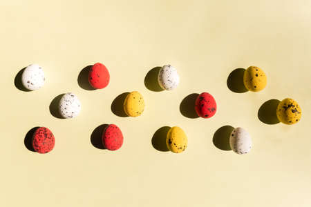 Happy Easter concept. Spring Easter holiday top view. Flat lay background with easter eggs. Easter greeting card background.の写真素材