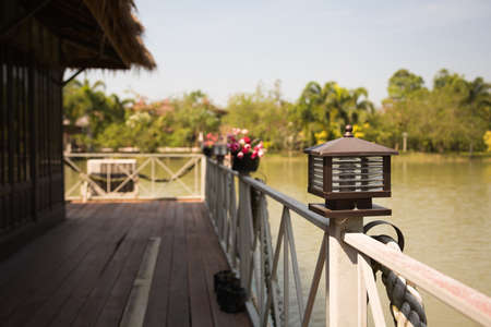 The lantern on the fence pierの写真素材