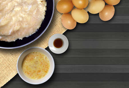 Fresh omelette fried in a pan for breakfast.