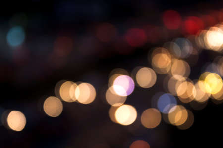 City and traffic light bokeh abstract Blur Background view from Above.Bokeh is the aesthetic quality...