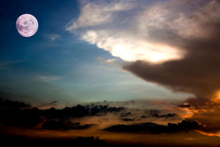 Full moon and the sunset sky background.