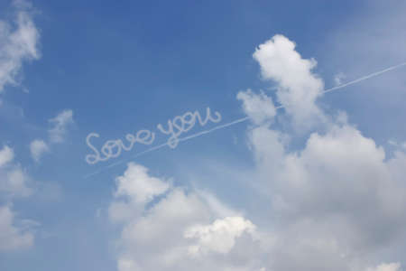 LOVE YOU from the Beautiful Cloudy sky background.の写真素材