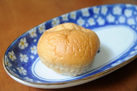 A bun bread in dish on the table 