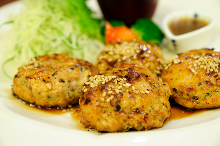 Japanese food, chicken cubes roasted with egg and vegetable 