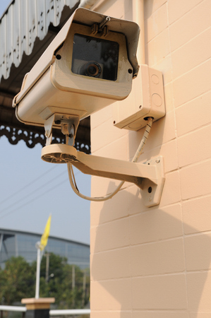 Securities camera front of housing development entry 