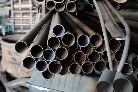 Stack of iron pipes, spar parts