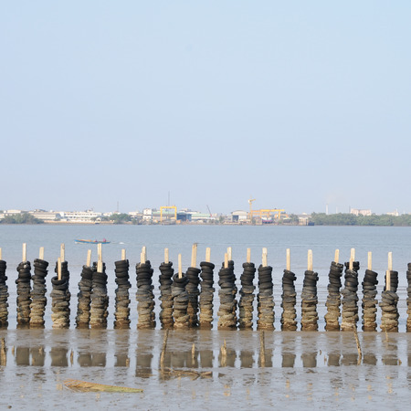 Wave barrier made from many old tires, Protectionの写真素材